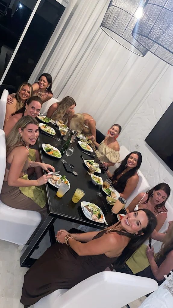 Guests enjoying a private chef dinner at one of our villas